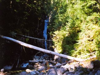 Falls near a fork in the trail, left fork goes to the end of Statlu, right to the upper lake, Statlu Lake 2001-08.